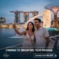 A-happy-couple-from-Chennai-taking-a-selfie-at-Merlion-Park-with-Marina-Bay-Sands-in-the-background-promoting-a-Singapore-tour-package